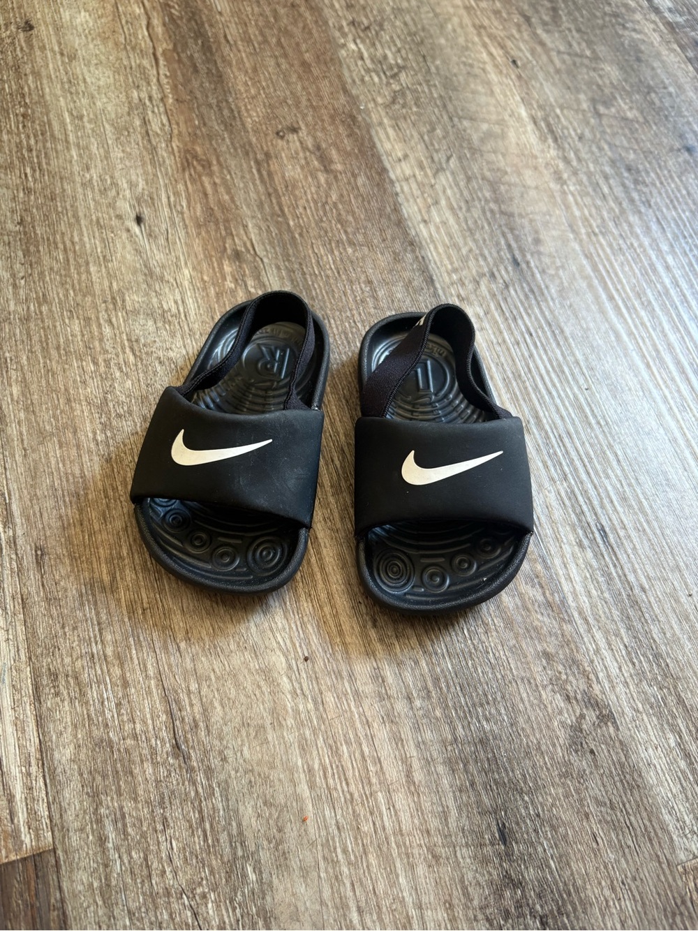 Nike baby Black Slide Sandals with White Swoosh